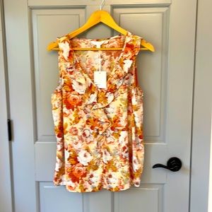 Silky floral shell with ruffled neckline